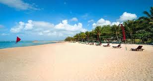Sanur Beach, calm water and a paved beachfront path