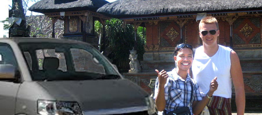 Private chauffeur with guest and vehicle at a Balinese temple compound